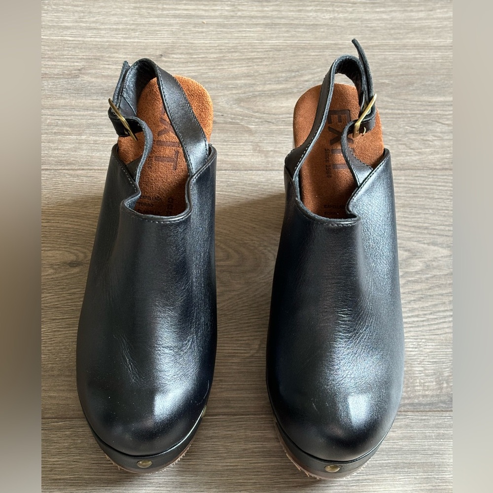 Black leather clogs. In perfect condition.